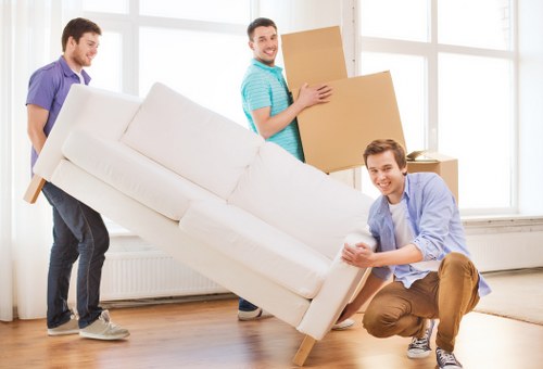 Professional movers organizing belongings