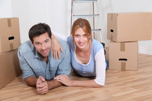 Experienced team handling office equipment during a move